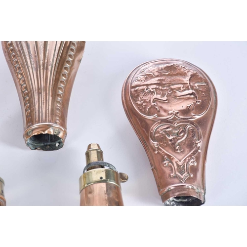 605 - A collection of ten 19th century brass and copper powder flasks, including manufacturers Dixon & Son... 