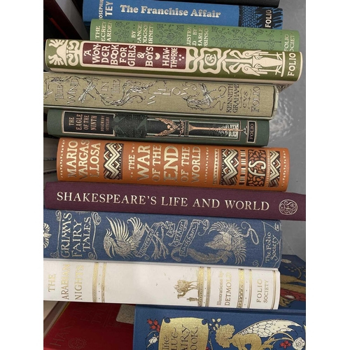 595 - A collection of Folio Society books, to include The Blue fairy Book by Andrew Lang - Charles van San... 