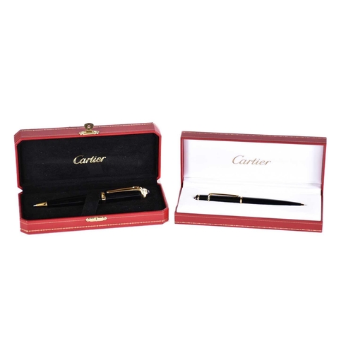 606 - A Diabolo de Cartier ballpoint pen, with blue cabochon, serial number 250610, in presentation case w... 