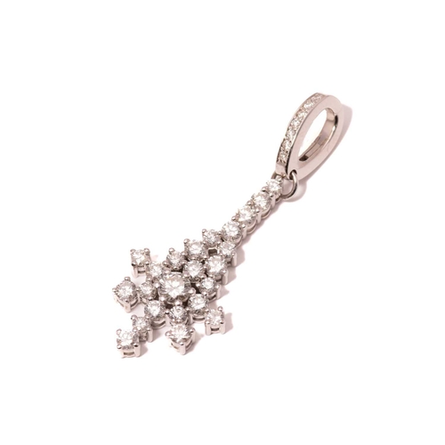 104 - A diamond enhancer pendant, encrusted with round brilliant diamonds claw set on a mount with an appl... 