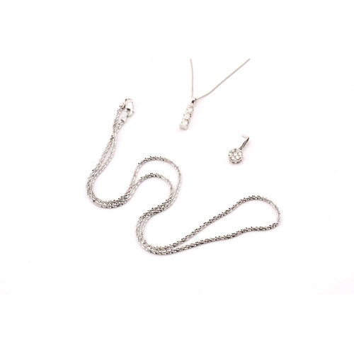 107 - A lot consists of two diamond pendants and a chain, one comprises three graduated round diamonds wit... 