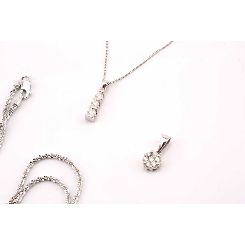 107 - A lot consists of two diamond pendants and a chain, one comprises three graduated round diamonds wit... 