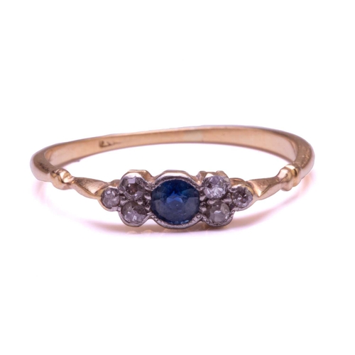 116 - A diamond and sapphire ring, comprises a round sapphire in the centre, flanked by single-cut diamond... 