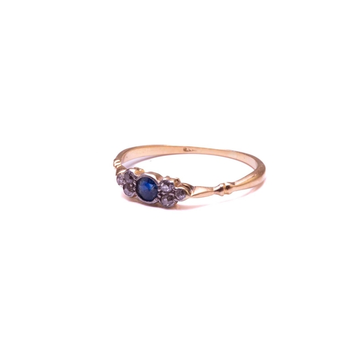 116 - A diamond and sapphire ring, comprises a round sapphire in the centre, flanked by single-cut diamond... 