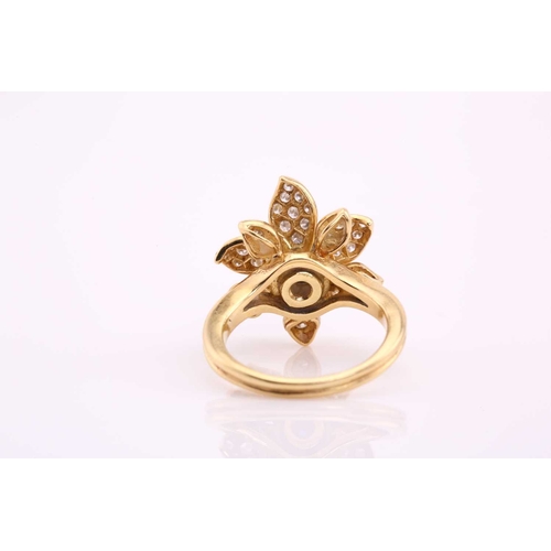 118 - An 18ct gold sapphire and diamond flower ring, comprises an oval sapphire cabochon with a high dome,... 