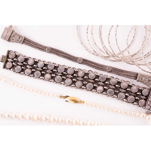 12 - A quantity of costume jewellery, to include examples of an 18ct gold Victorian crescent and star bro... 