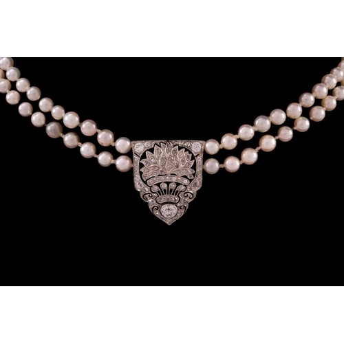 120 - A Belle Époque style pearl choker, comprises a 'giardinetti' centrepiece bordered with millgrain det... 