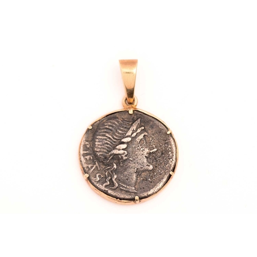182 - A Roman silver coin pendant, showcasing a M. Herennius silver denarius coin, laureate head of Pietas... 