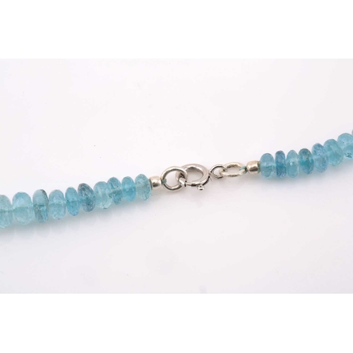 189 - A faceted aquamarine bead necklace, comprising a string of ninety-one aquamarine beads in light blue... 