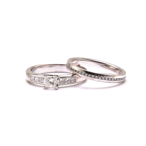 206 - A diamond engagement ring and an eternity ring in 18ct gold, the engagement ring features a princess... 