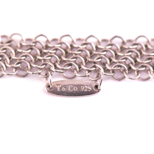209 - Tiffany & Co. - A silver mesh bib necklace with tie ends, designed by Elsa Peretti, signed by T&Co. ... 