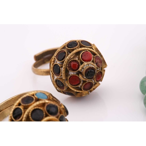 26 - A lot consisting of miscellaneous jewellery items, two domed Turkman style scarf rings in yellow met... 