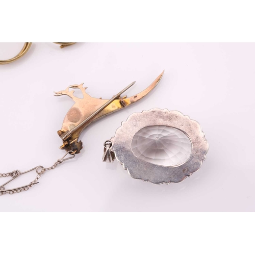 26 - A lot consisting of miscellaneous jewellery items, two domed Turkman style scarf rings in yellow met... 