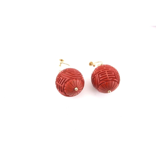 3 - A Chinese lacquer carved bead necklace and matching earrings; the necklace consists of twenty-five s... 