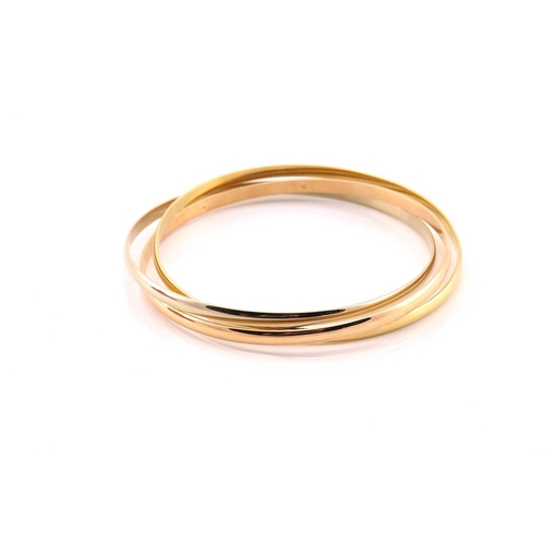 33 - A Cartier trinity bracelet, featuring three interlocking bands in 18ct yellow, pink and white gold, ... 