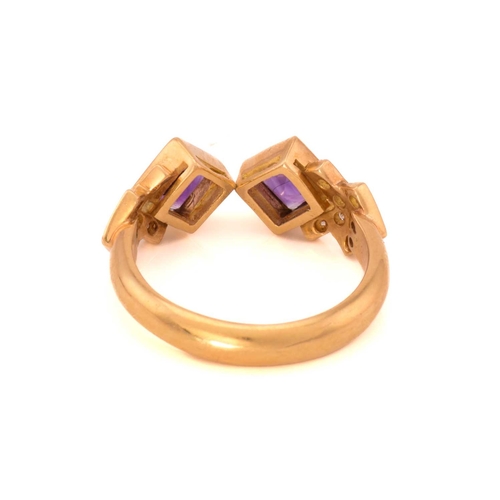 41 - An amethyst and diamond dress ring, featuring two square-cut amethysts collet set in yellow precious... 
