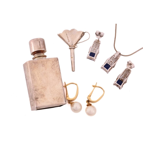 46 - A silver cased perfume bottle with funnel, a pair of pearl drop earrings, a gem-set necklace and ear... 