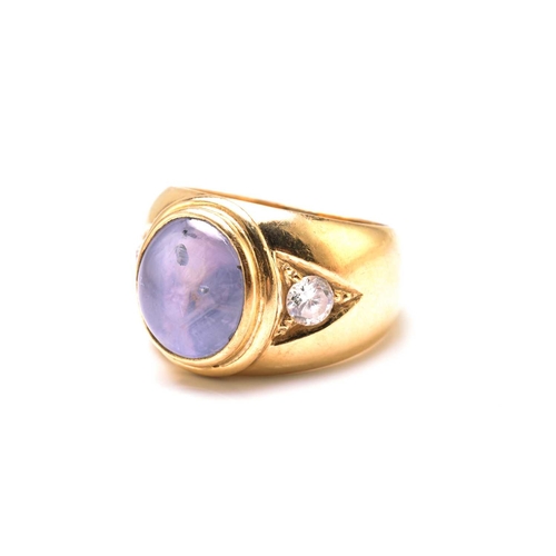 48 - A star sapphire and cubic zirconia gypsy ring, consisting of a pale blue star sapphire approximately... 