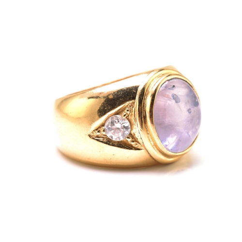48 - A star sapphire and cubic zirconia gypsy ring, consisting of a pale blue star sapphire approximately... 