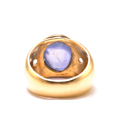 48 - A star sapphire and cubic zirconia gypsy ring, consisting of a pale blue star sapphire approximately... 