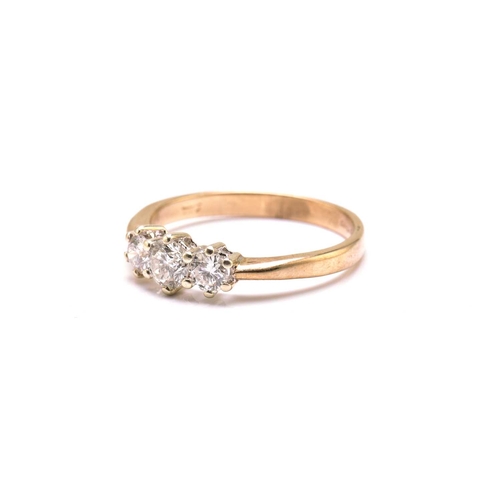 55 - A 9ct gold and three-stone diamond ring, consisting of three brilliant diamonds with an estimated to... 
