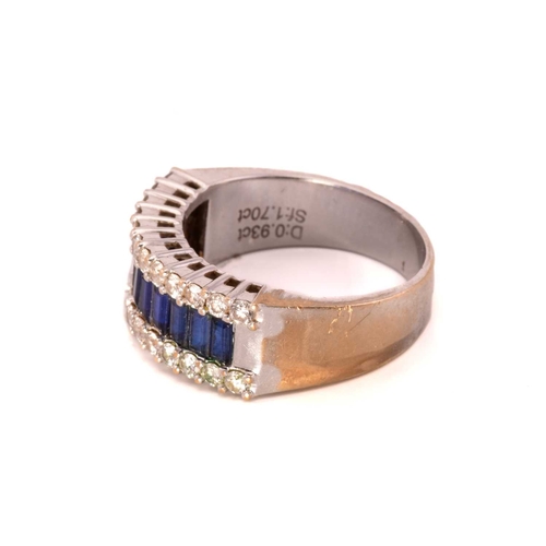 61 - A three-row sapphire and diamond dress ring, set with a central tramline of baguette-cut synthetic s... 