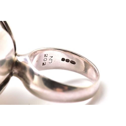 62 - Georg Jensen - a silver flower ring with chrysoprase, with a chrysoprase bead set in a flowerhead mo... 