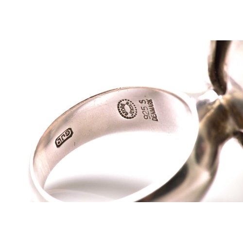62 - Georg Jensen - a silver flower ring with chrysoprase, with a chrysoprase bead set in a flowerhead mo... 