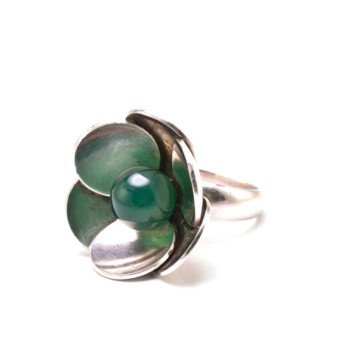 62 - Georg Jensen - a silver flower ring with chrysoprase, with a chrysoprase bead set in a flowerhead mo... 