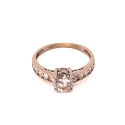 64 - A selection of gem-set rings; to include a CZ half hoop ring in 14ct gold, London 1994, size T; a tw... 