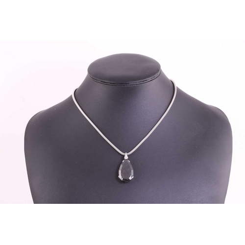 70 - A carbonado diamond pendant on chain, featuring a large pear-shaped faceted carbonado (polycrystalli... 