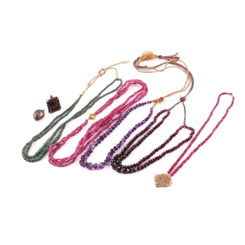 73 - A mixed lot of bead necklaces and two gem-set pendants; two ruby faceted bead necklaces with yellow ... 