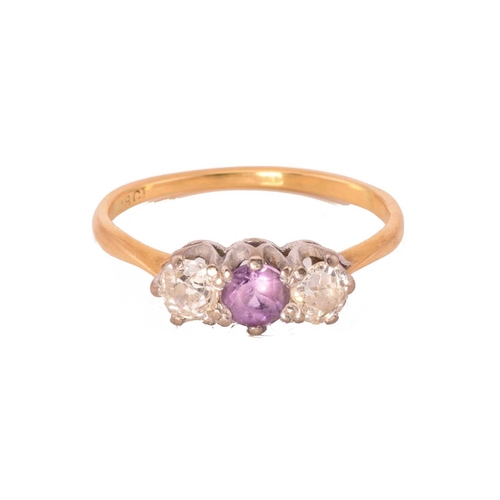 8 - Two gem-set rings with diamonds and amethyst; the first consists of a three-stone diamond ring, star... 