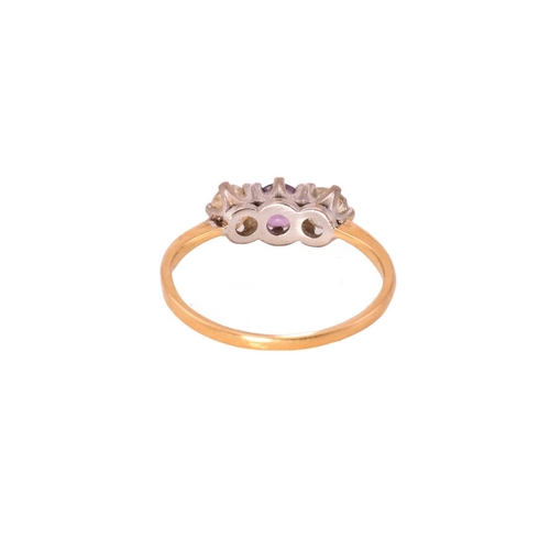 8 - Two gem-set rings with diamonds and amethyst; the first consists of a three-stone diamond ring, star... 