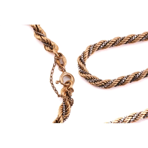 82 - A two-toned twisted necklace and matching bracelet; The necklace consists of a 9ct gold rope chain t... 