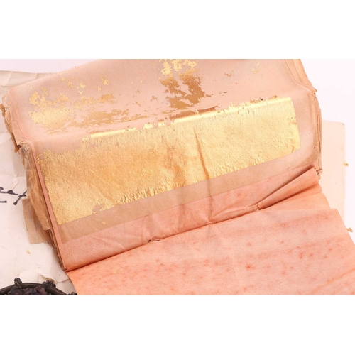 85 - A moulded glass cameo style brooch; the purple frosted glass bust portrait of a woman with ringlets ... 