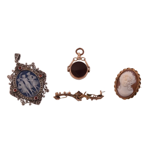 97 - A small mixture of 9ct gold jewellery and a cameo marcasite pendant; A helmet shell cameo brooch, in... 