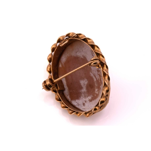 97 - A small mixture of 9ct gold jewellery and a cameo marcasite pendant; A helmet shell cameo brooch, in... 