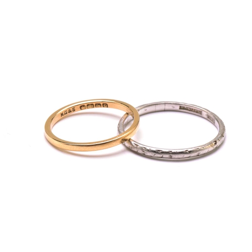 245 - An 18ct gold ring and a platinum ring, the gold ring has a plain court band, stamped 'FIDELITY' insi... 