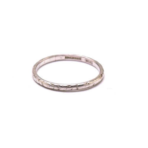 245 - An 18ct gold ring and a platinum ring, the gold ring has a plain court band, stamped 'FIDELITY' insi... 