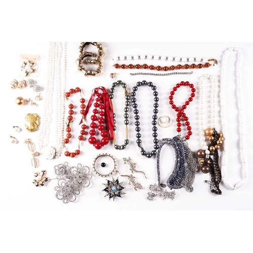 246 - A mixed collection of costume jewellery including necklaces, bangles, clip-on earrings and various b... 