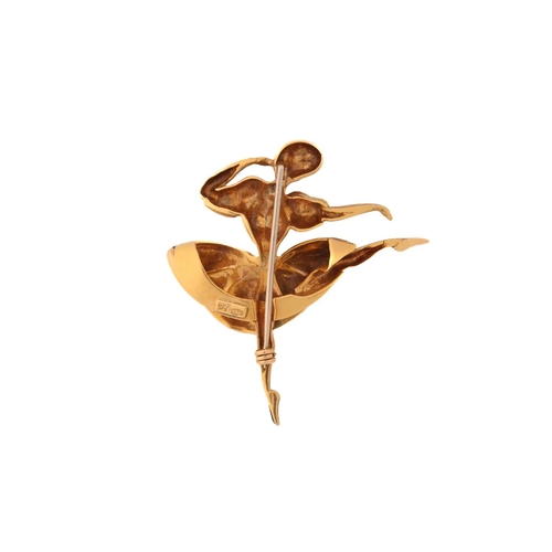 253 - An enamel ballerina brooch, featuring a figurine of a dancing ballerina in a textured dress with ena... 