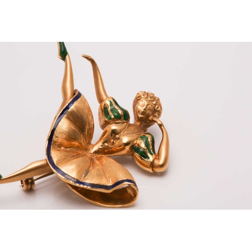 253 - An enamel ballerina brooch, featuring a figurine of a dancing ballerina in a textured dress with ena... 
