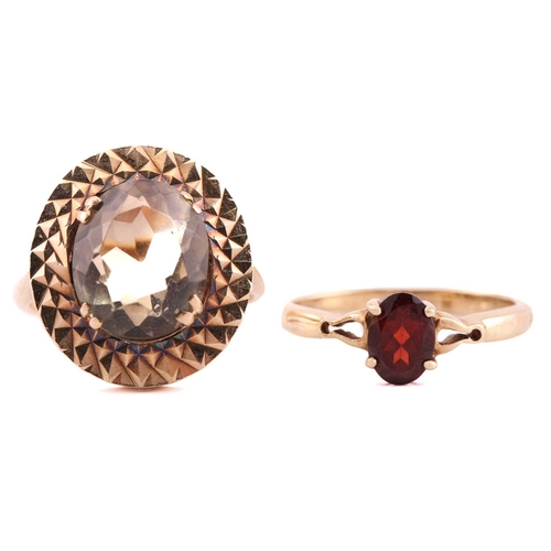 257 - Two 9ct gold gem-set rings, one has an oval smoky quartz/citrine approximately measures 11.9 x 9.9 m... 