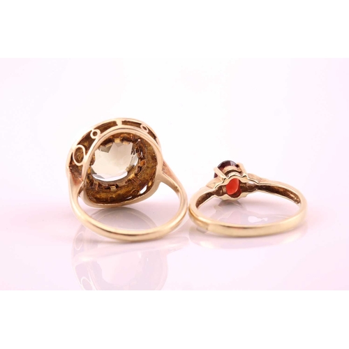 257 - Two 9ct gold gem-set rings, one has an oval smoky quartz/citrine approximately measures 11.9 x 9.9 m... 