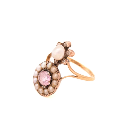 258 - An Edwardian pink topaz and pearl dress ring, featuring an oval-cut pale pink topaz approximately me... 