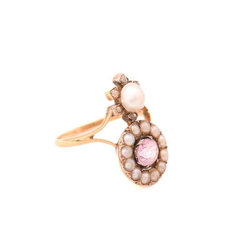258 - An Edwardian pink topaz and pearl dress ring, featuring an oval-cut pale pink topaz approximately me... 