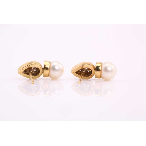259 - A pair of pearl and diamond earrings, each consisting of an 8.5 mm cream coloured pearl with pink ov... 