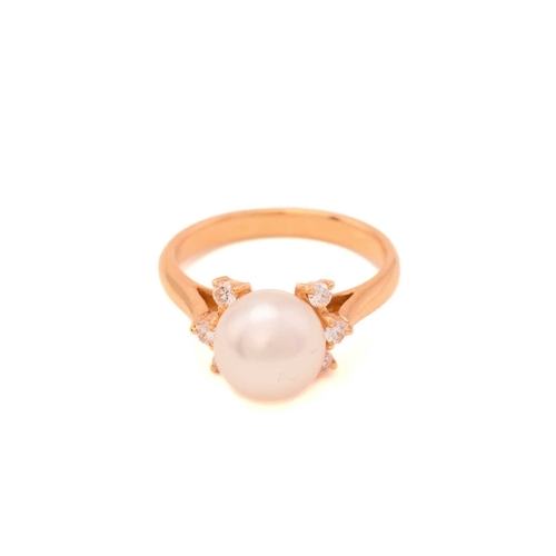 262 - A double row pearl bracelet with a matching ring, the bracelet comprises two strands of 6.0 mm round... 