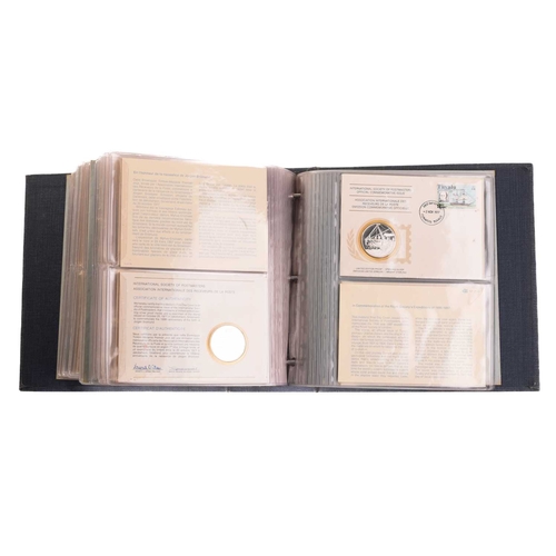 275 - International Society of Postmasters commemorative album, 1975-1977, thirty six First Day Covers eac... 